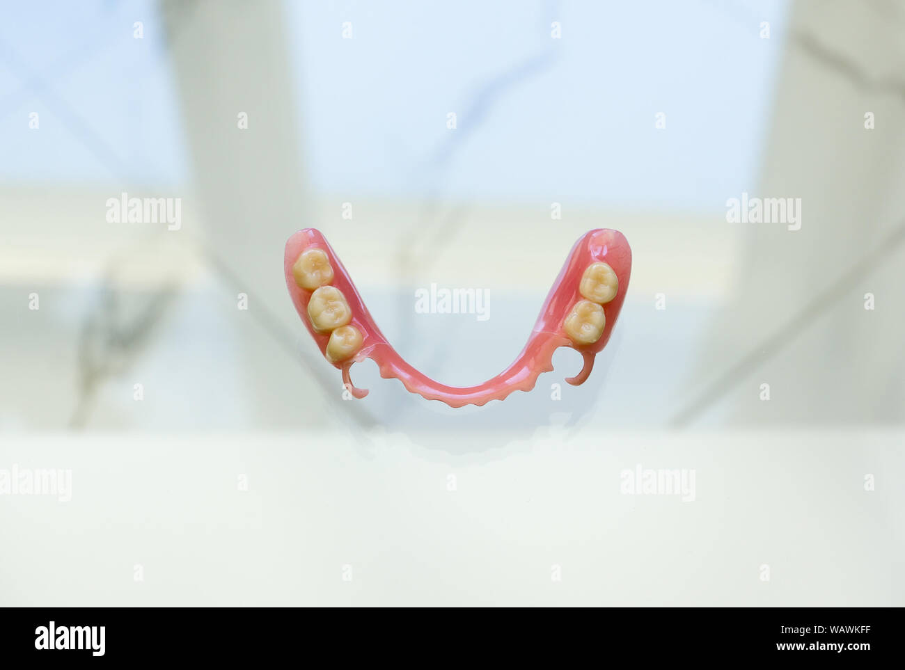 large image of a modern denture nylone on a glass background Stock Photo