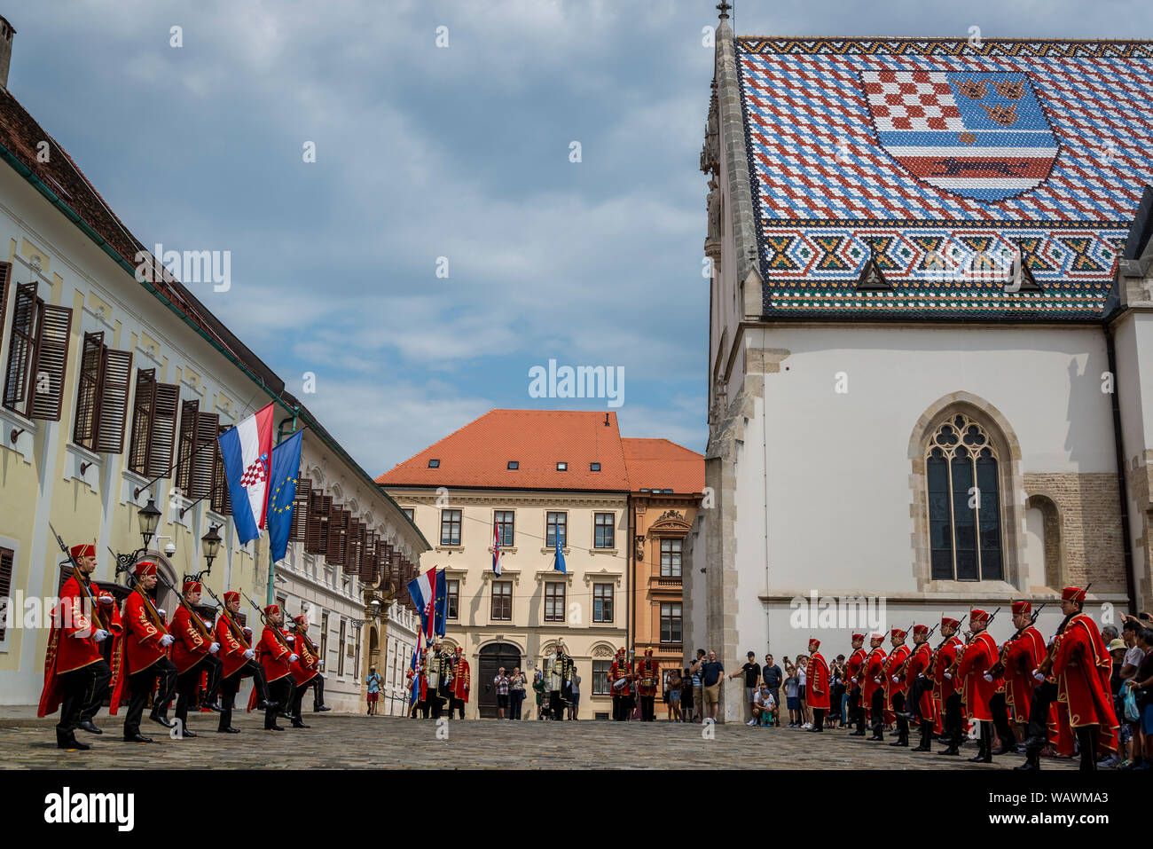 The Changing of the Guard, Croatian soldiers in historical regalia in ceremonial parade at St Mark's Square, Zagreb, Croatia Stock Photo