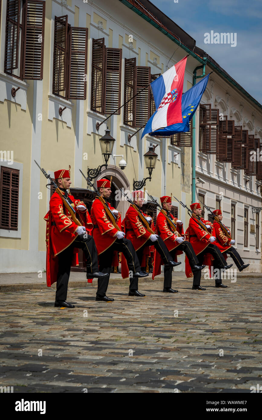 The Changing of the Guard, Croatian soldiers in historical regalia in ceremonial parade at St Mark's Square, Zagreb, Croatia Stock Photo