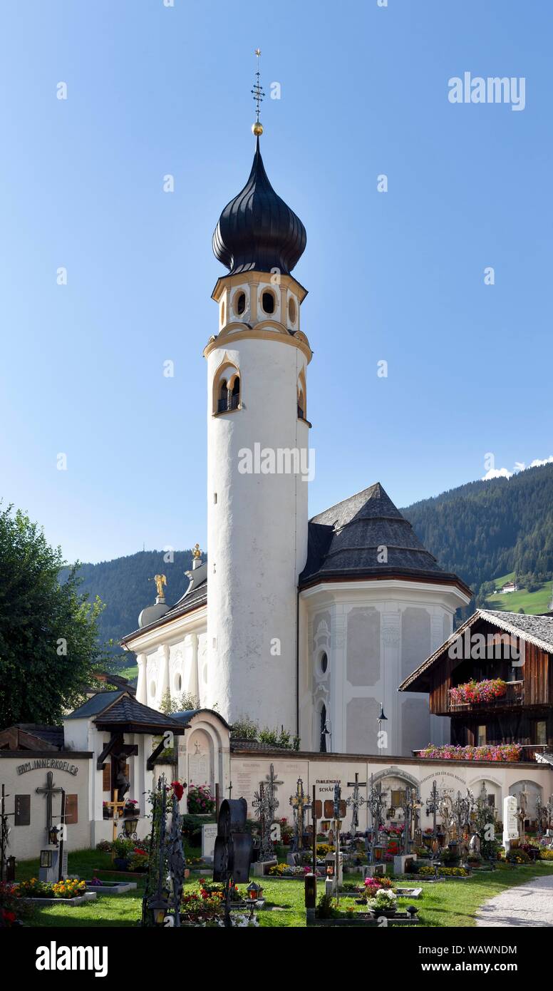 Baroque parish church St. Michael with cemetery, San Candido, Alta Pusteria, South Tyrol, Italy Stock Photo