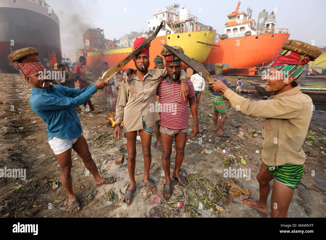 Dock workers in a shipyard in Dhaka, Bangladesh. Shipbuilding in