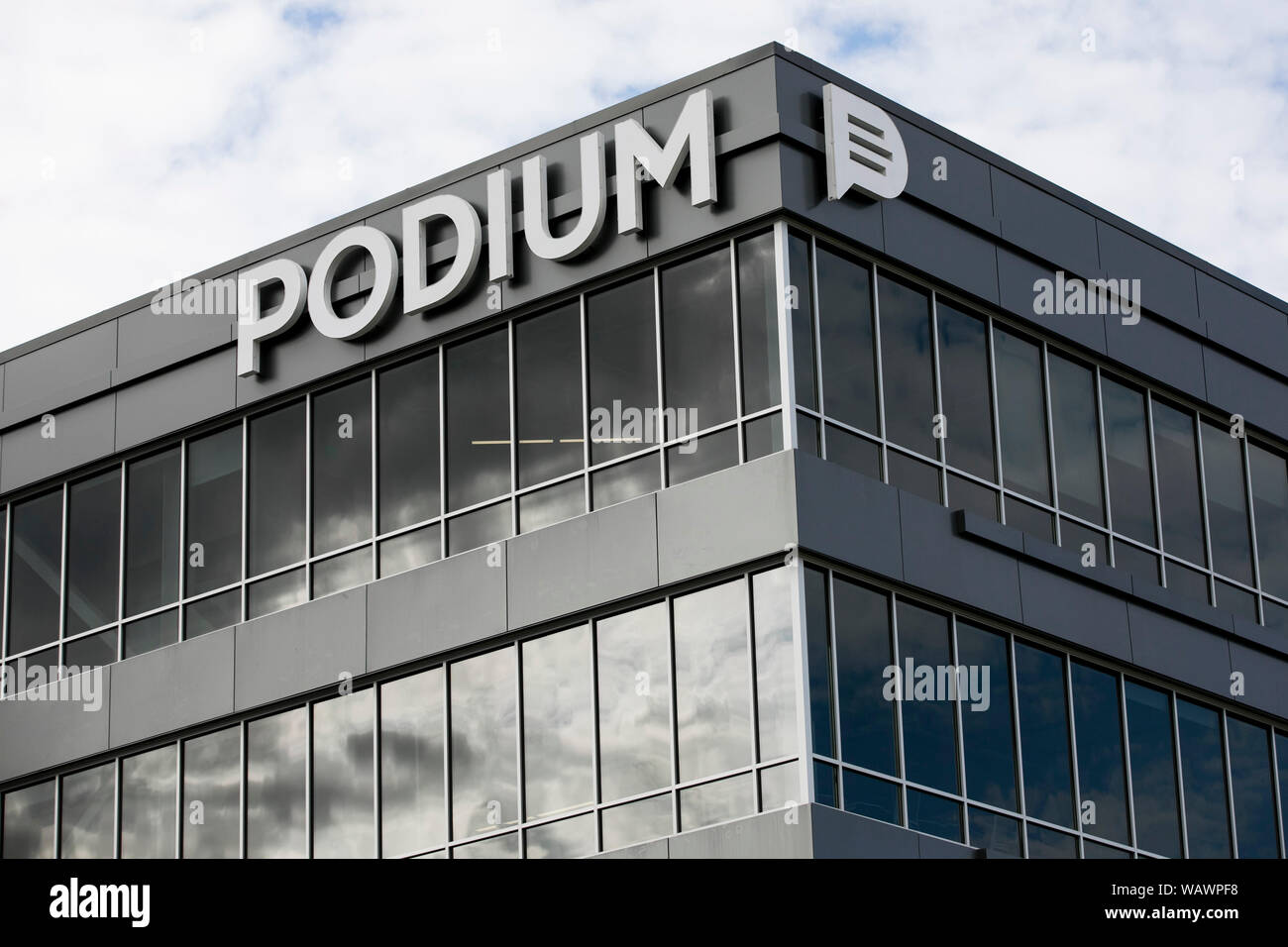 A logo sign outside of the headquarters of software provider Podium in Lehi, Utah on July 27, 2019. Stock Photo