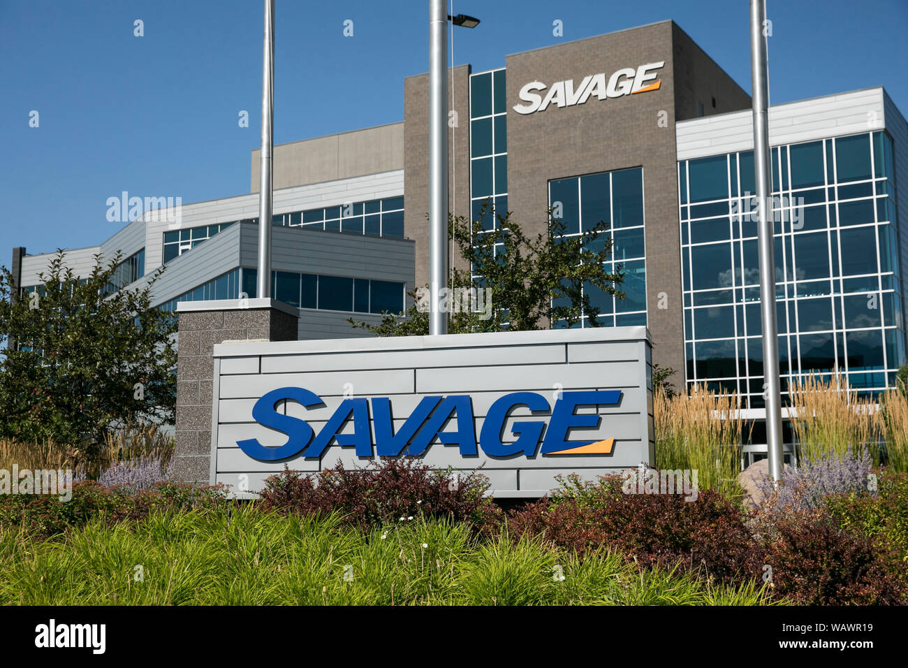 A logo sign outside of the headquarters of Savage Services in Midvale ...