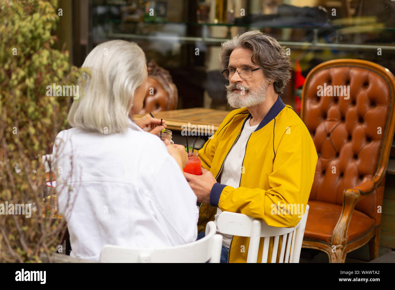 Man being deep in thought during his lunch. Stock Photo