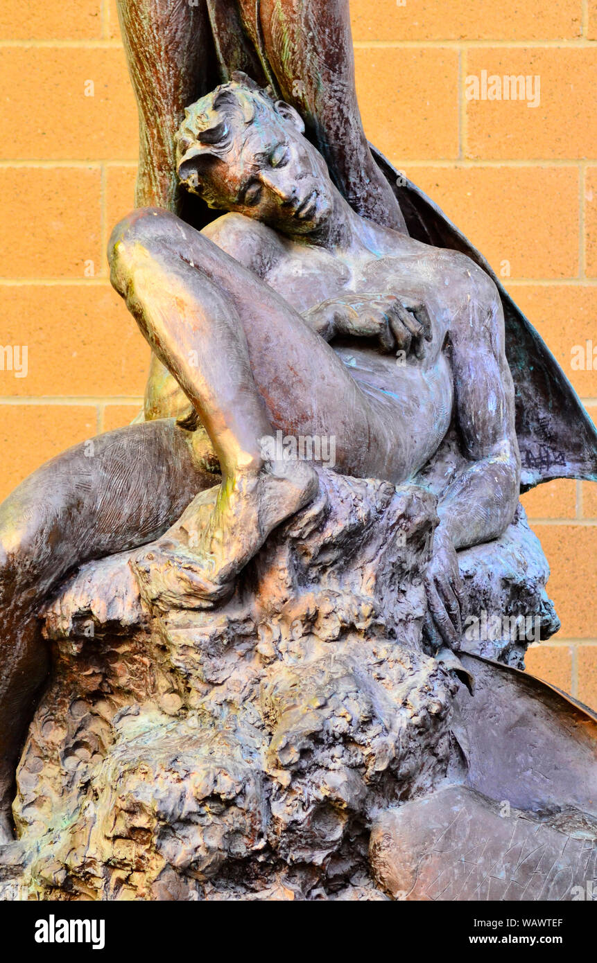 Detail of man in 'Our Lady of Pittsburg' 2003 bronze statue in Heritage Plaza, 4th Street Pittsburg California.  Sculptor Jason Greigo. Stock Photo