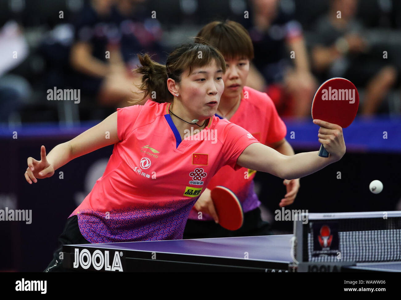 Olomouc, Czech Republic. 22nd Aug, 2019. Chen Xingtong/Qian Tianyi (L) of China compete during a women's doubles round of 16 match against Stephanie Loeuillette/Audrey Zarif of France during 2019 ITTF Czech Open in Olomouc, the Czech Republic, Aug. 22, 2019. Credit: Shan Yuqi/Xinhua/Alamy Live News Stock Photo