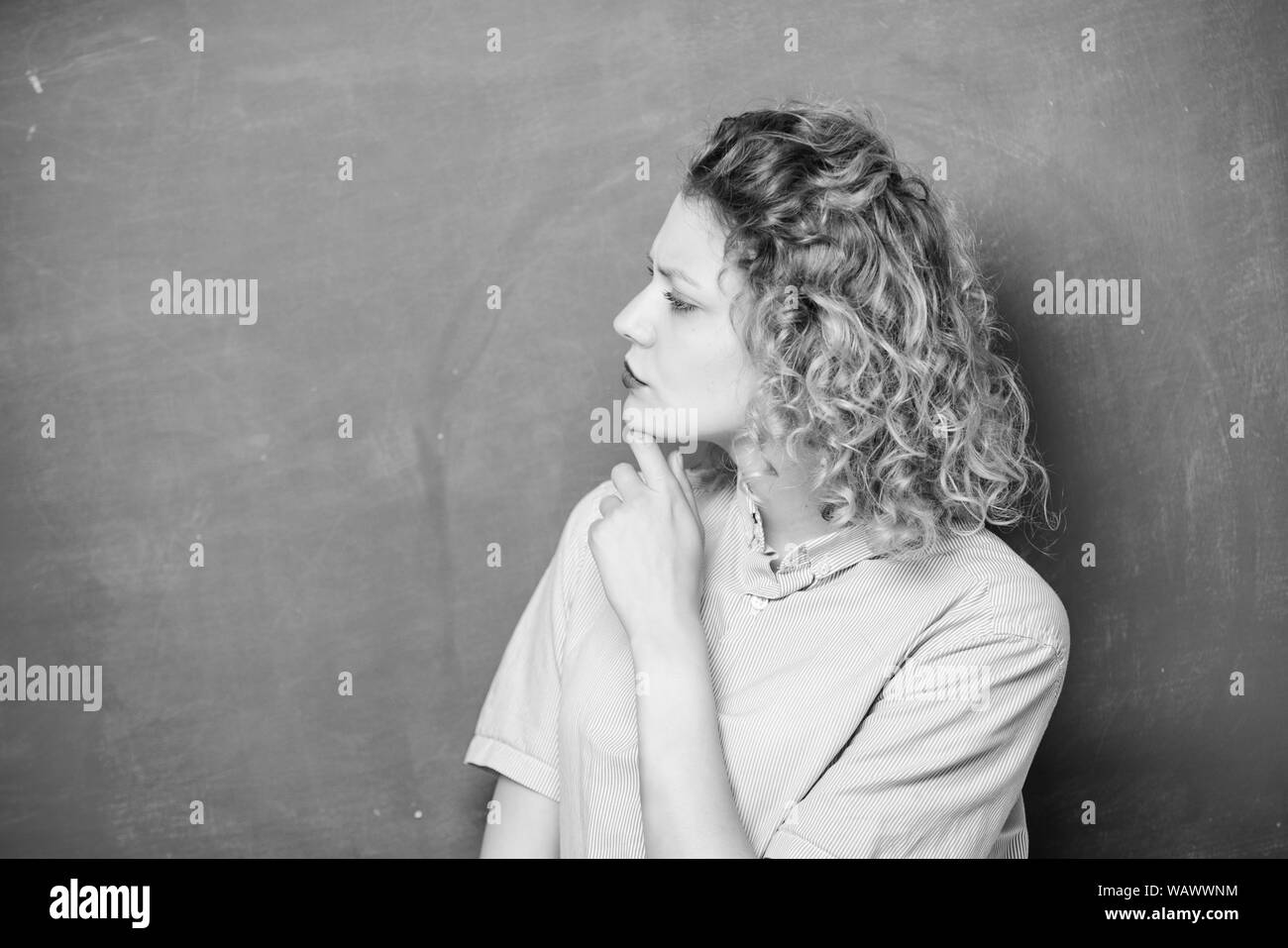 Student on exam. knowledge day. empty blackboard information. back to school. woman likes