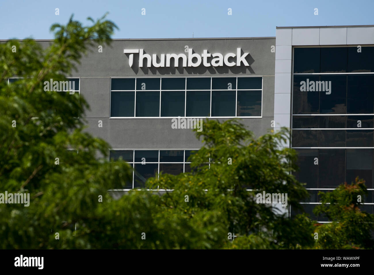 A logo sign outside of a facility occupied by Thumbtack in Draper, Utah on July 27, 2019. Stock Photo