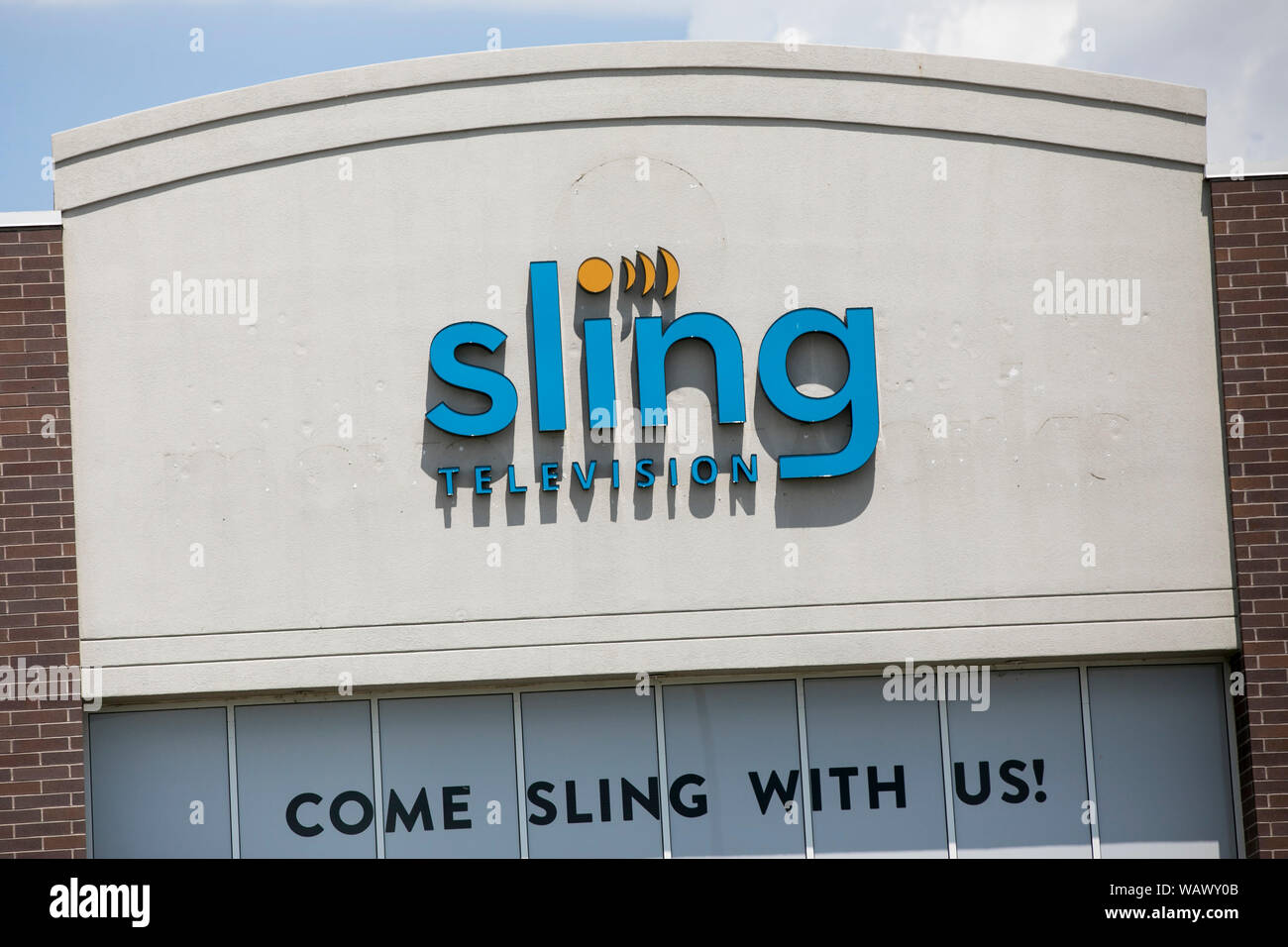A logo sign outside of a facility occupied by Sling Television in American Fork, Utah on July 27, 2019. Stock Photo