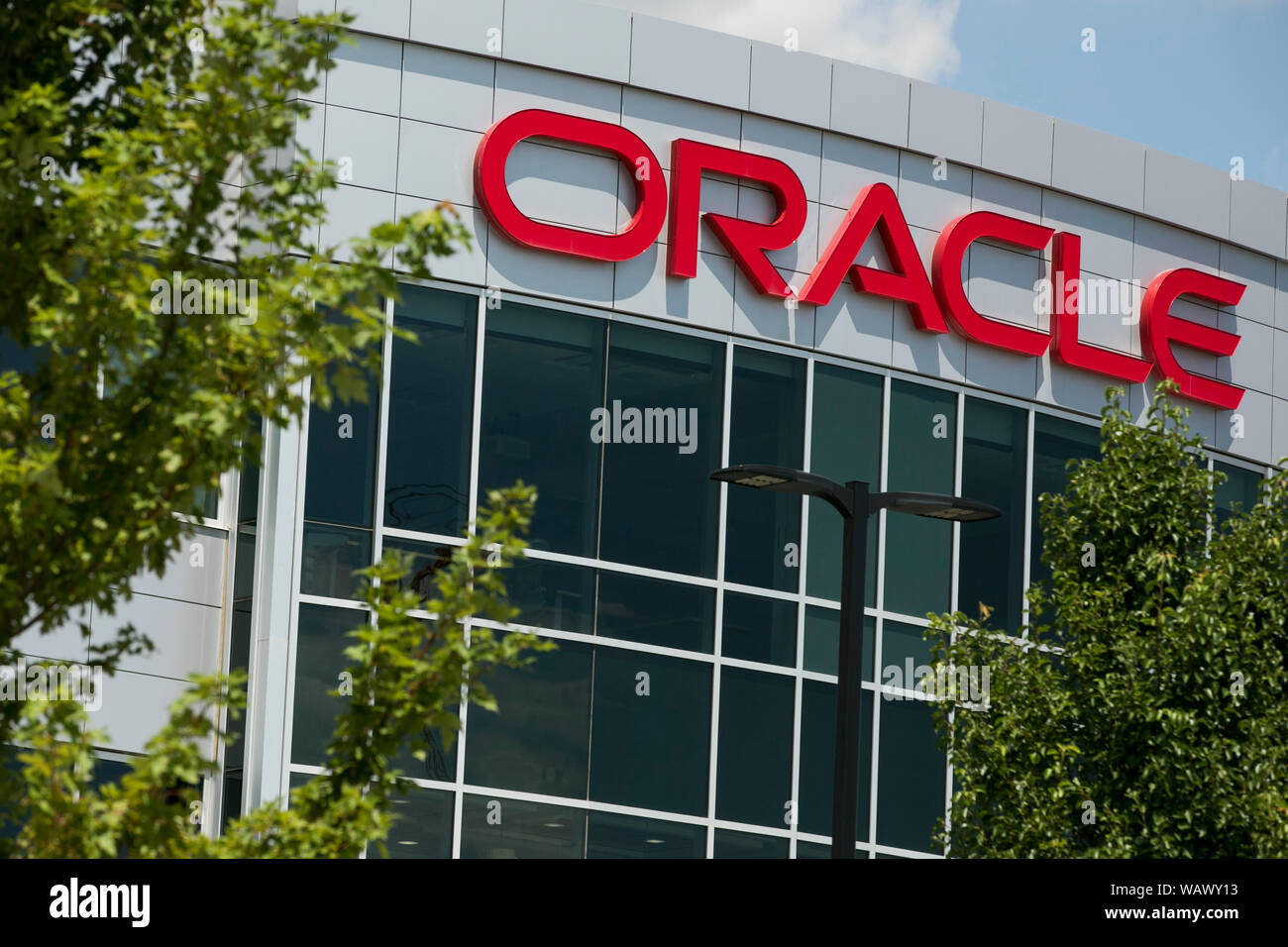 A logo sign outside of a facility occupied by the Oracle Corporation in Lehi, Utah on July 27, 2019. Stock Photo