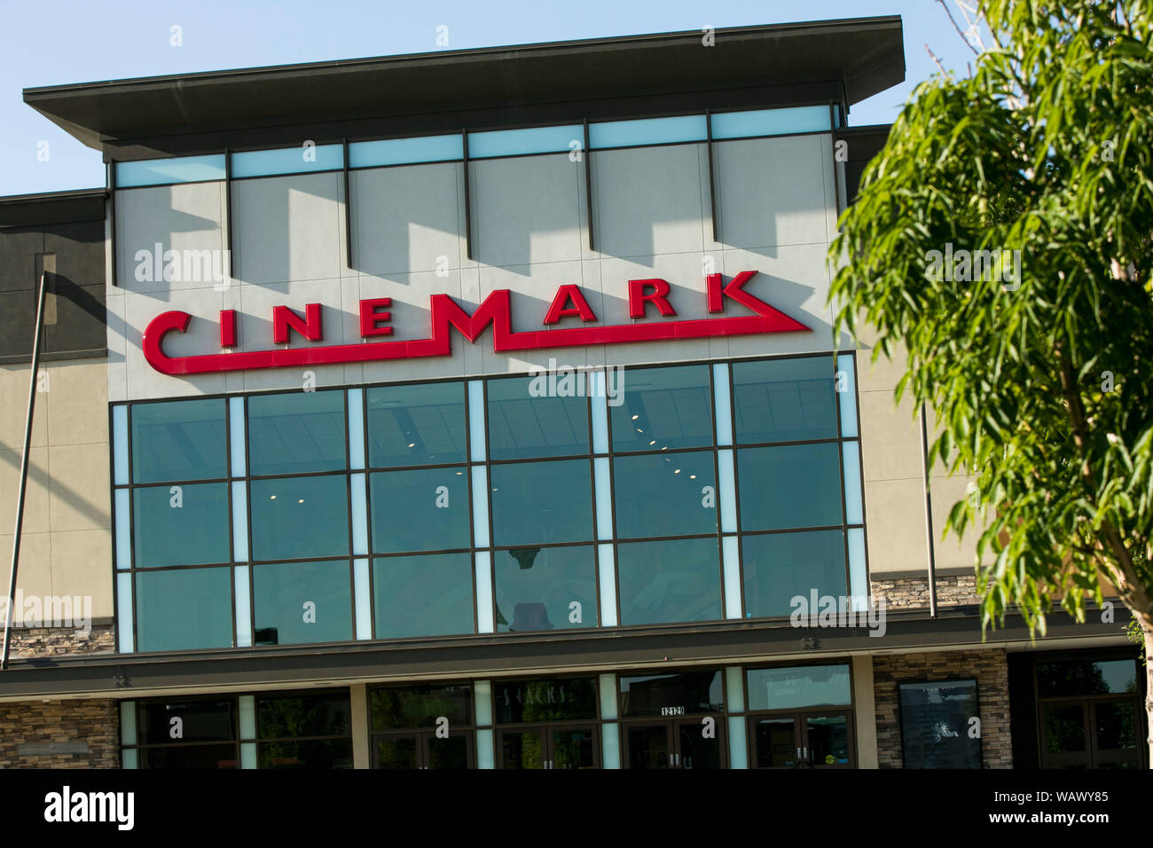 A logo sign outside of a Cinemark movie theater location in Draper, Utah on July 28, 2019 Stock