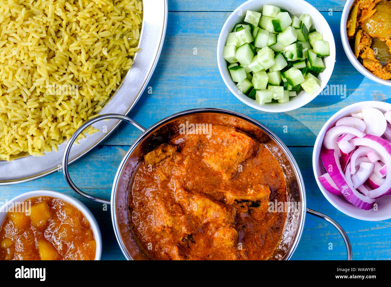 Indian Style Butter Chicken Curry and Pilau Yellow Rice Rice Stock