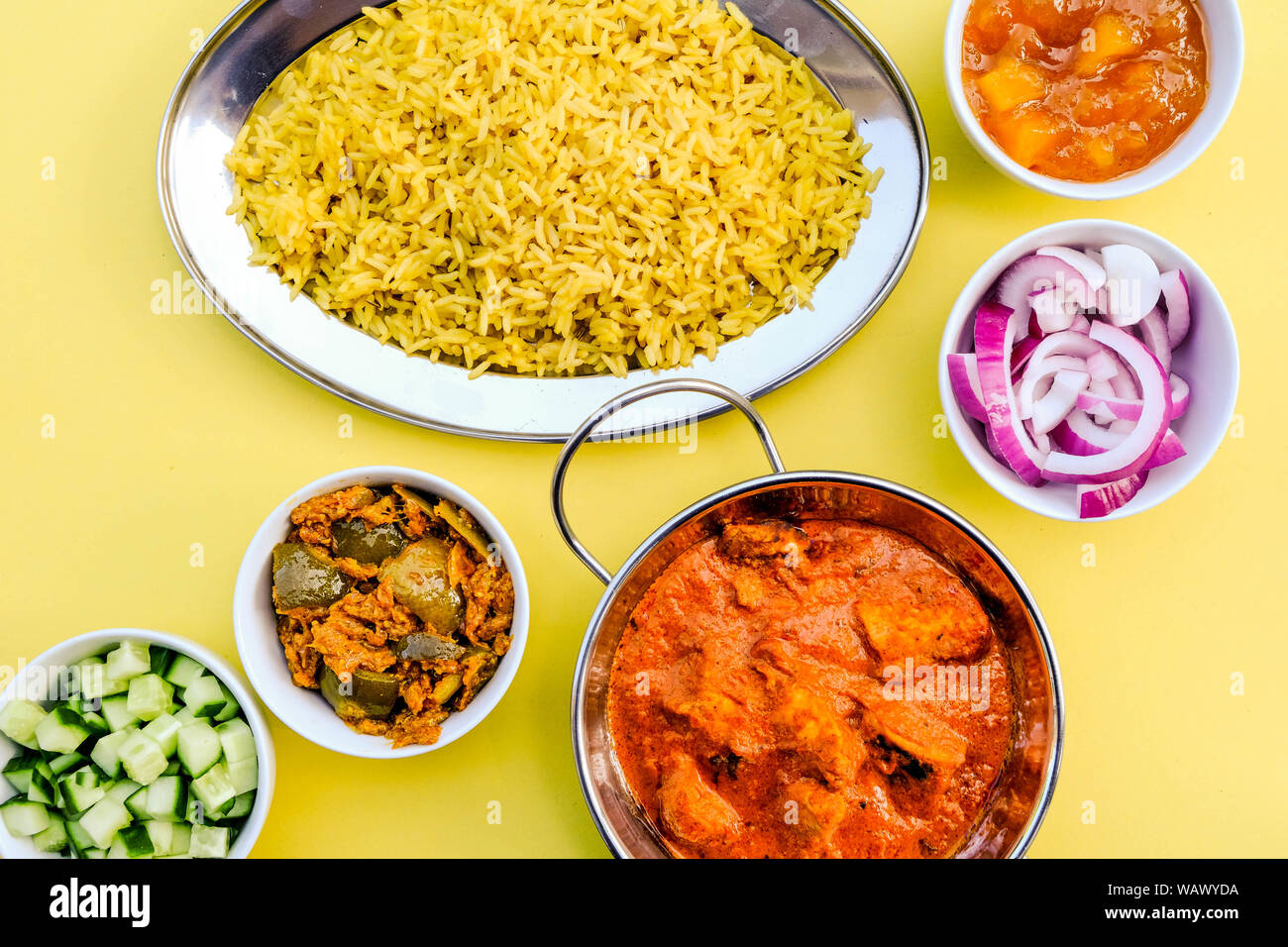 Indian Style Butter Chicken Curry and Pilau Yellow Rice Rice Stock