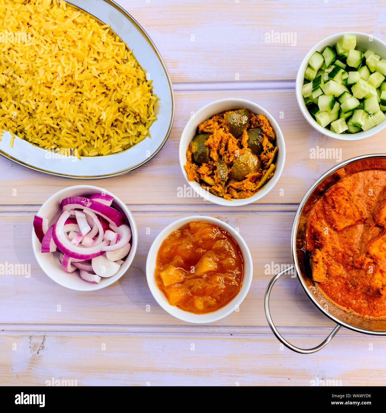 Indian Style Butter Chicken Curry and Pilau Yellow Rice Rice Stock