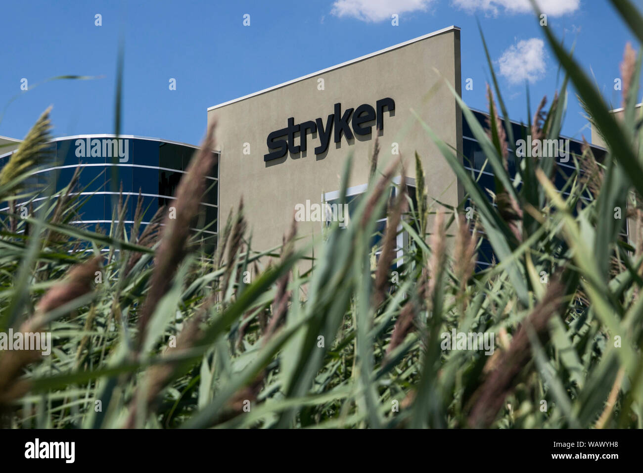 A logo sign outside of a facility occupied by the Stryker Corporation in Salt Lake City, Utah on