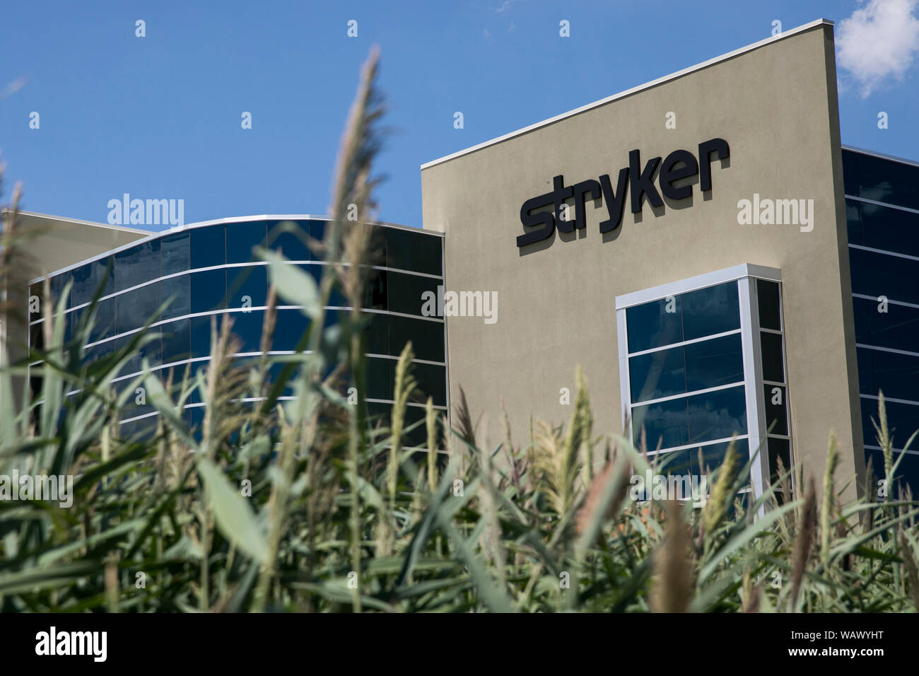 A logo sign outside of a facility occupied by the Stryker Corporation in Salt Lake City, Utah on