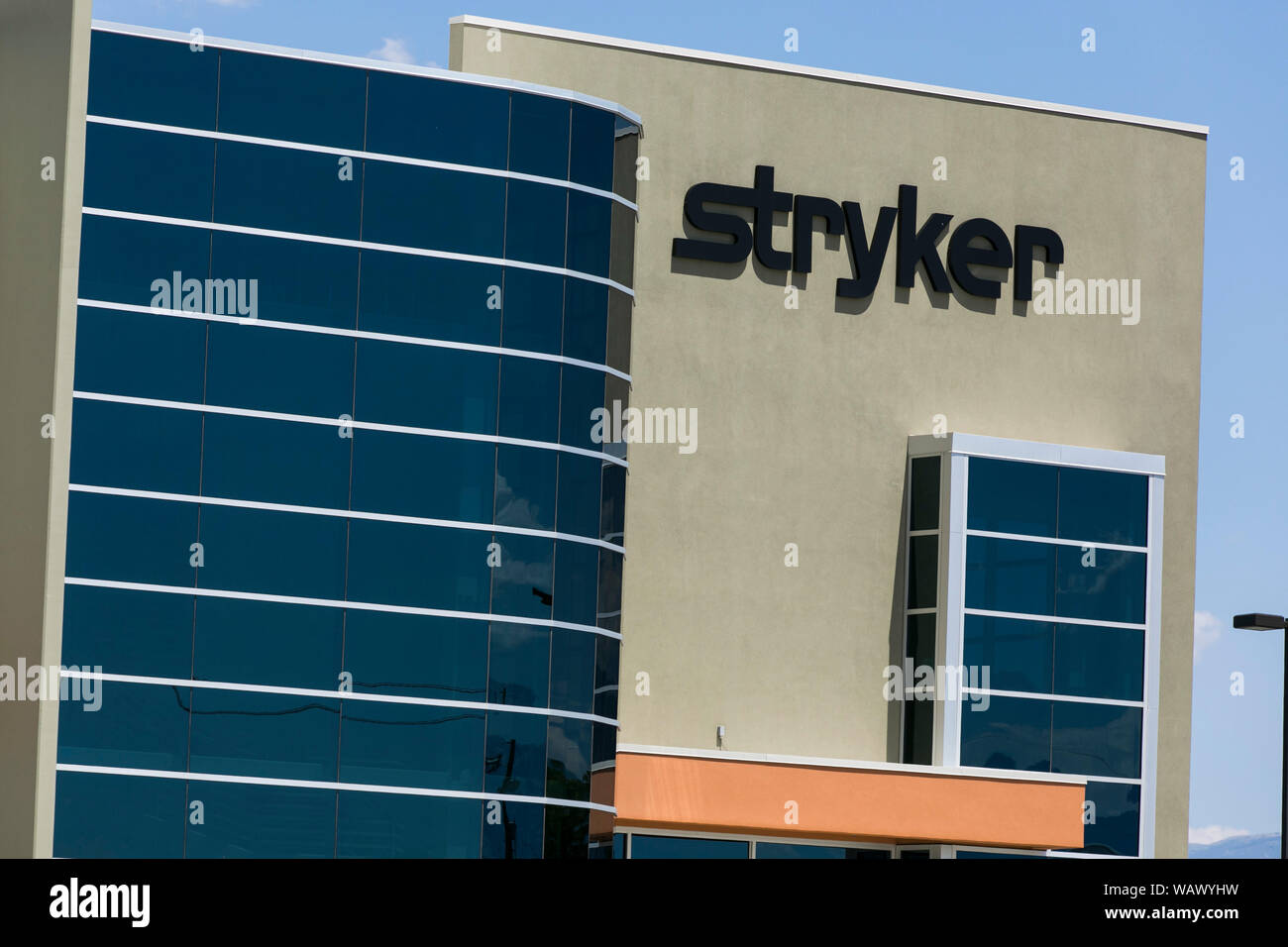 A logo sign outside of a facility occupied by the Stryker Corporation in Salt Lake City, Utah on