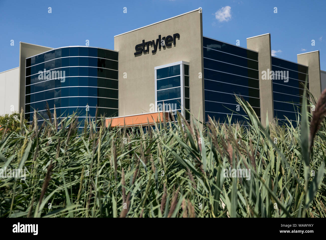 A logo sign outside of a facility occupied by the Stryker Corporation in Salt Lake City, Utah on