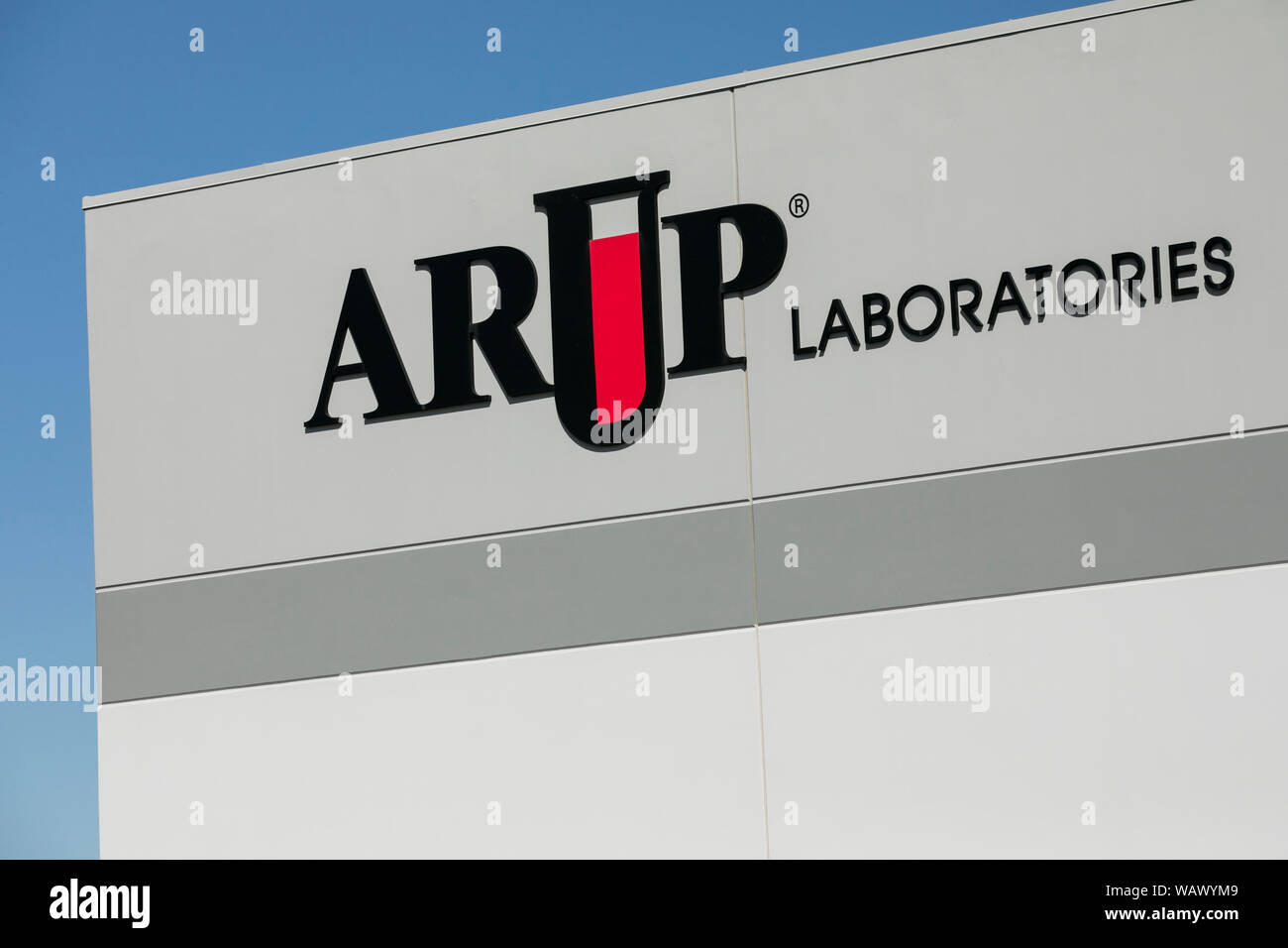 A logo sign outside of a facility occupied by ARUP Laboratories in Salt