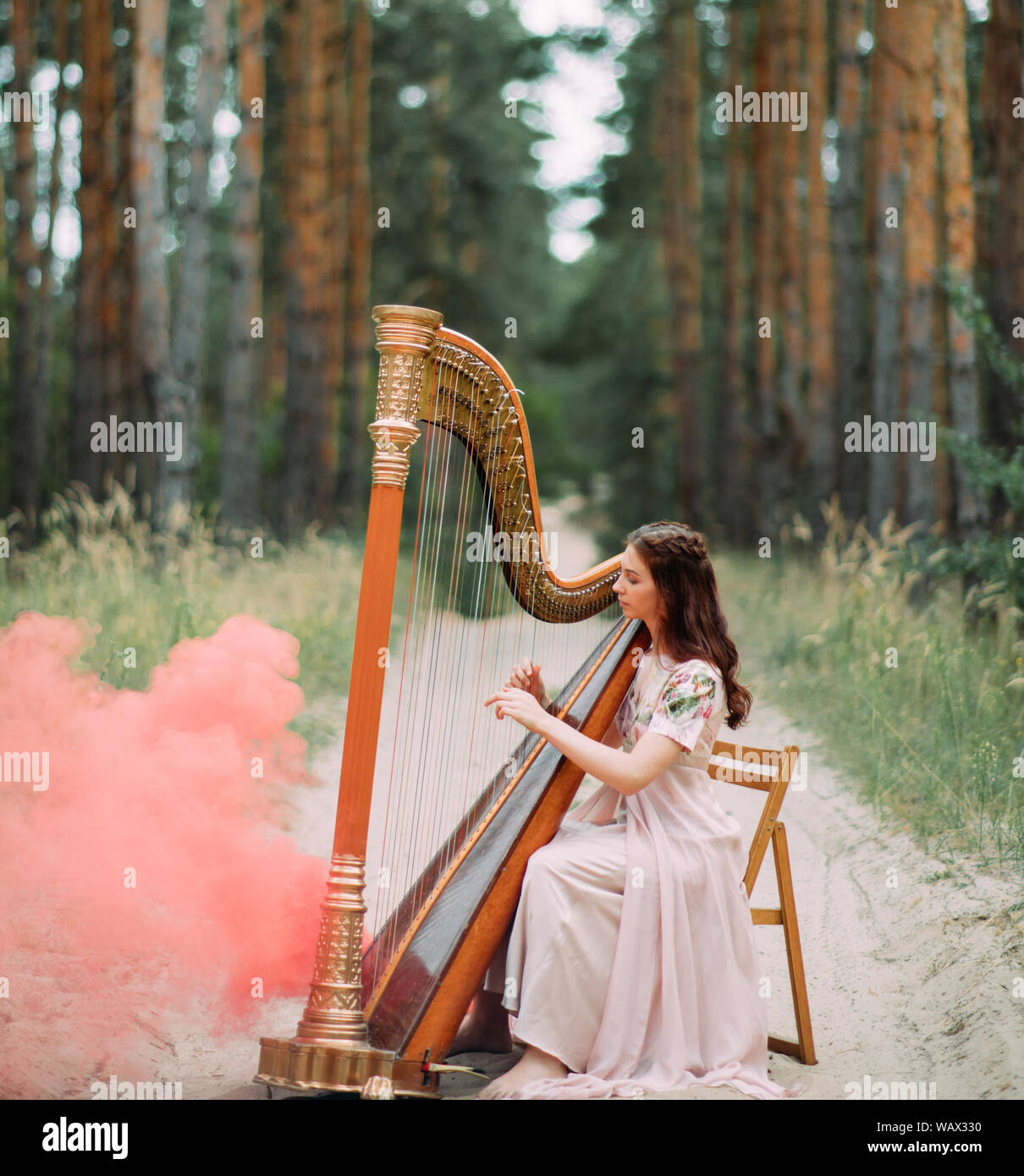 Smoking Lady Plays in the Forest