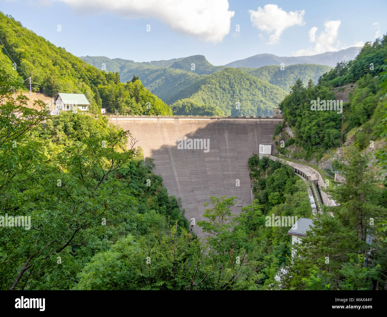 Vagli Sotto landscape view with dam on Lago ie Lake Vagli, Garfagnana, Italy. Built to provide hydroelectric power, it submerged a village called Stock Photo