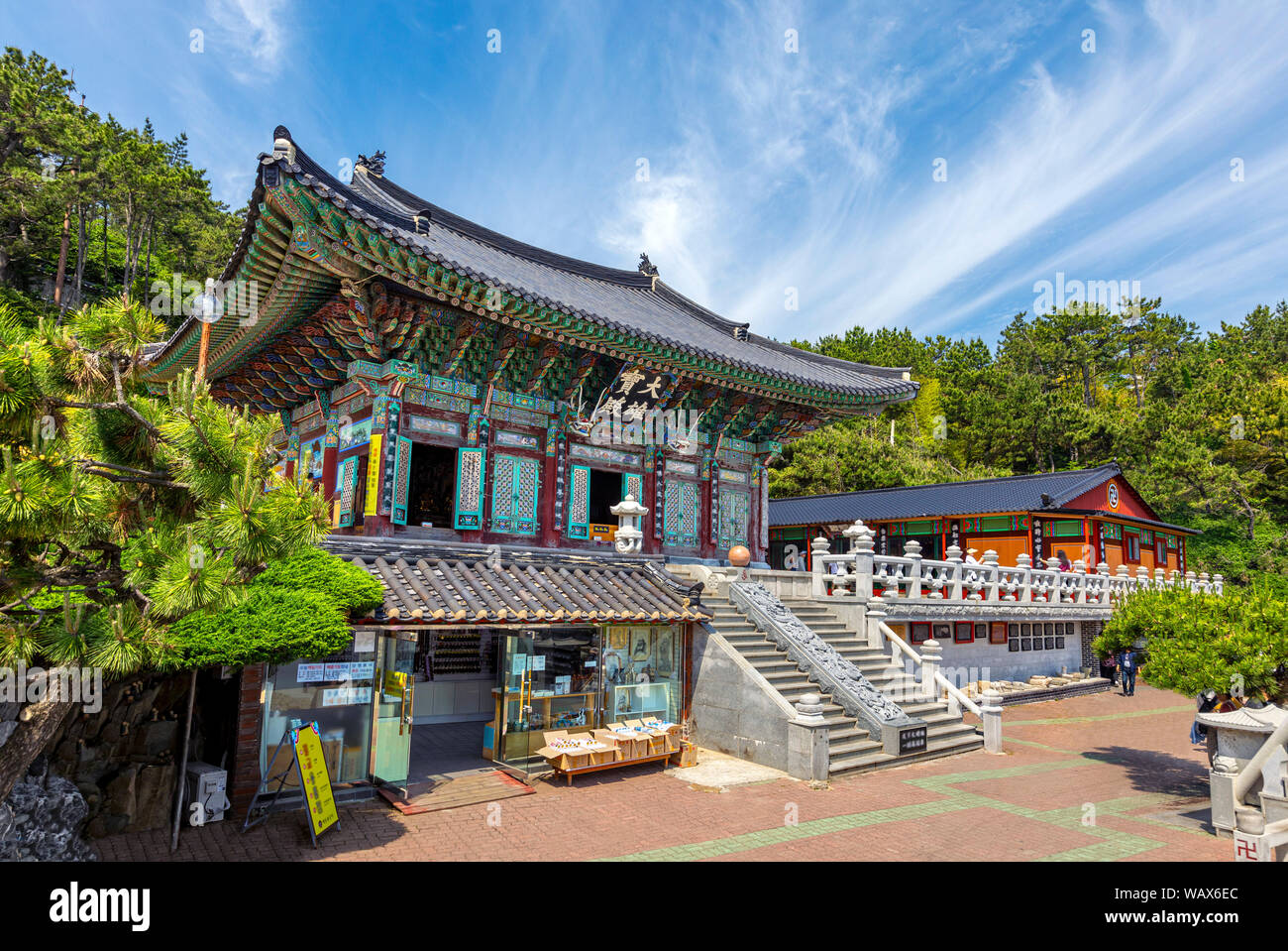 Haedong Yonggungsa Temple in Busan, South Korea.  The Chinese text translates "Grand Hall" Stock Photo