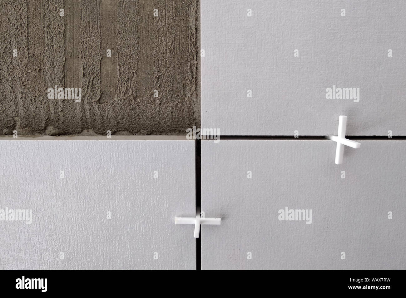 Wall ceramic tiles installation on mortar glue Stock Photo Alamy