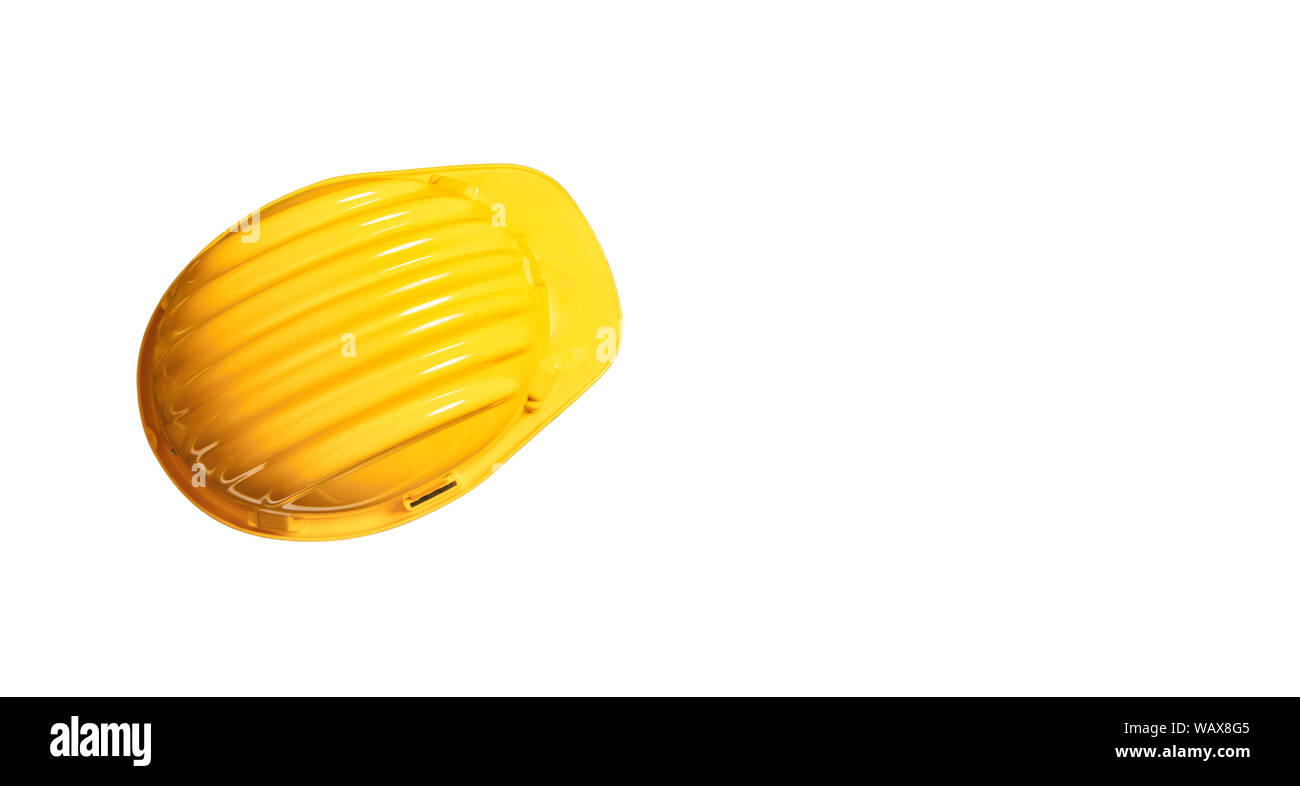 Construction safety. Hard hat yellow color isolated cut out against white background, copy space Stock Photo