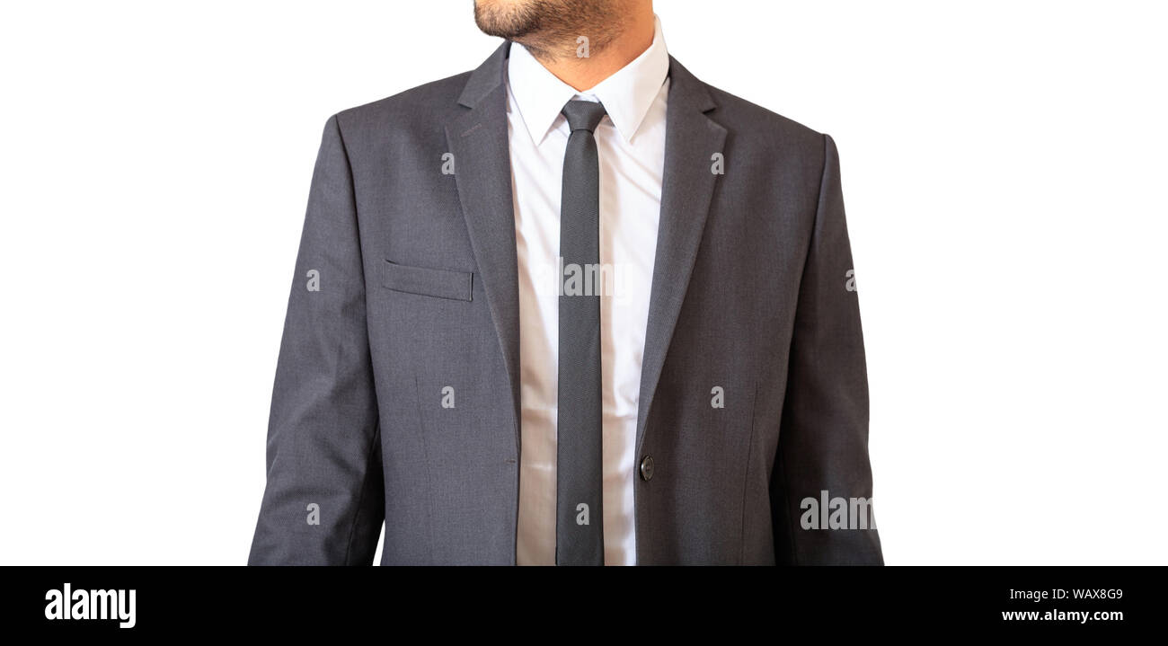 Male body part young businessman in gray suit and tie standing isolated cutout, against white background. Stock Photo