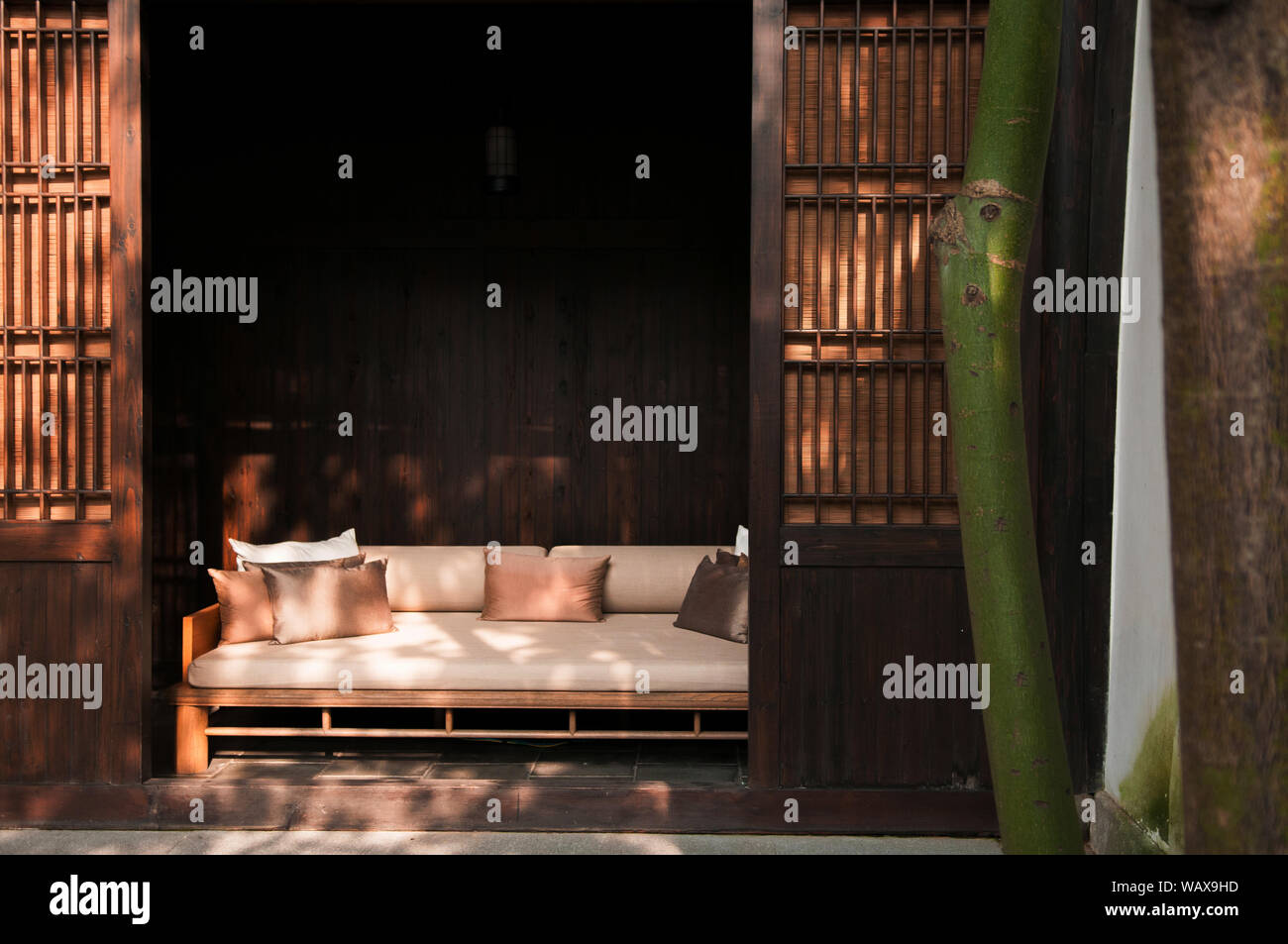 AUG 18, Hangzhou, China Contemporary Chinese style sofa couch behind