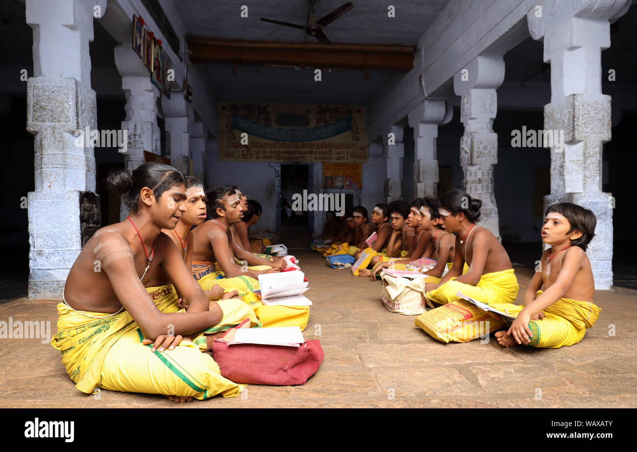 Brahmin students in a traditional Brahmin school in the Thiruparankundram Murugan temple in Madurai, India. Stock Photo