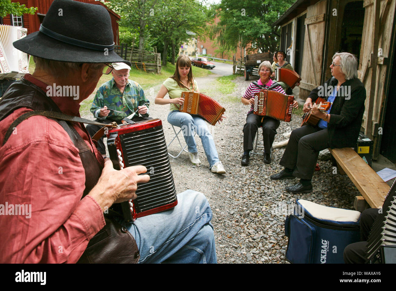 FOLKMUSIC at a folk music festival accordion improvises Stock Photo