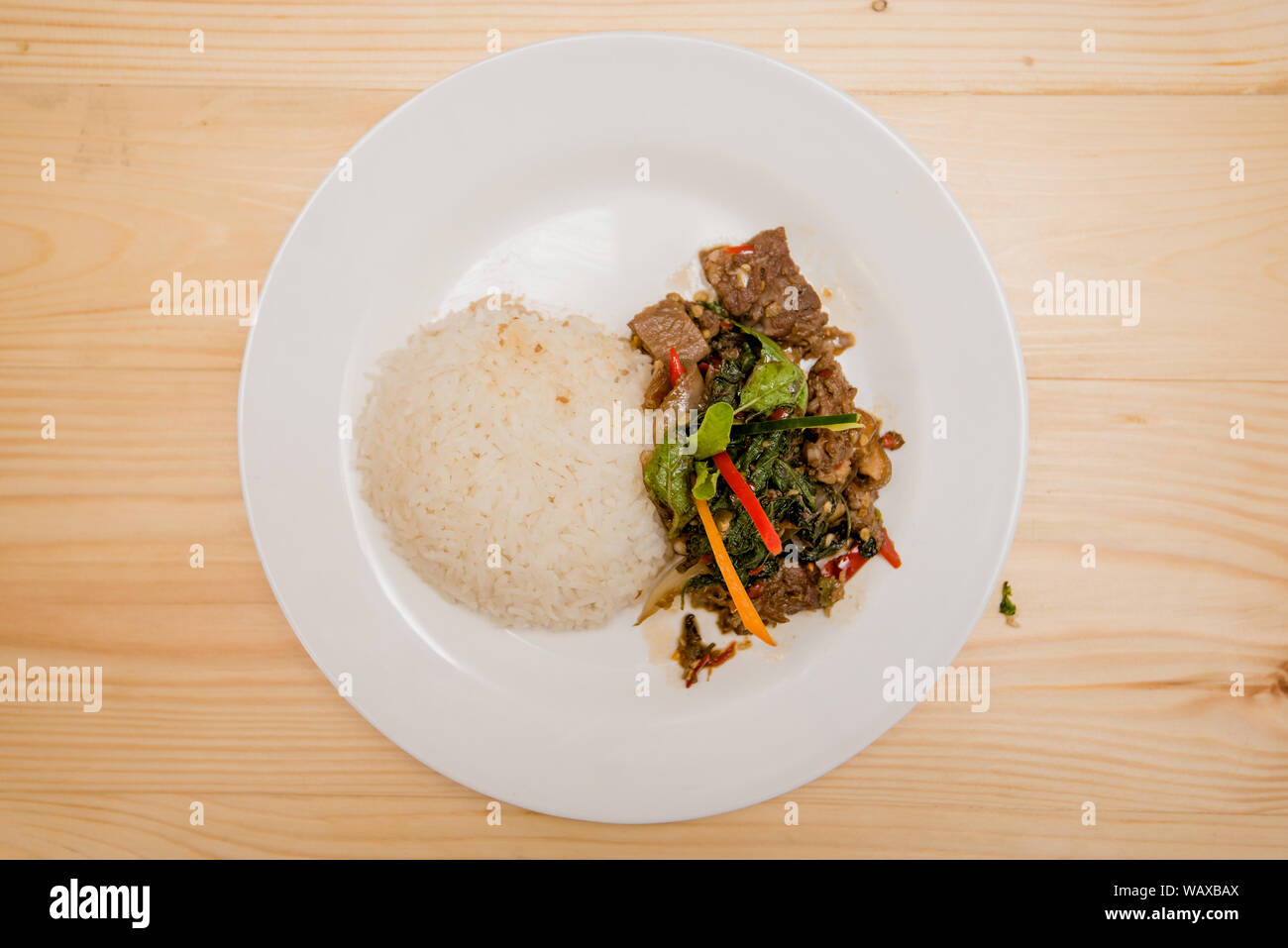 stirfried meat and basil with rice, Thai food Stock Photo Alamy