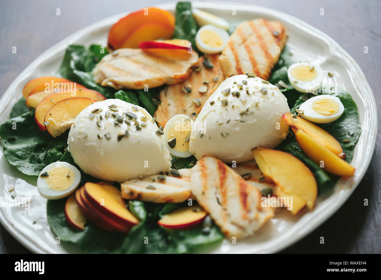 Vegetarian food. Mozzarella salad on a dish Stock Photo