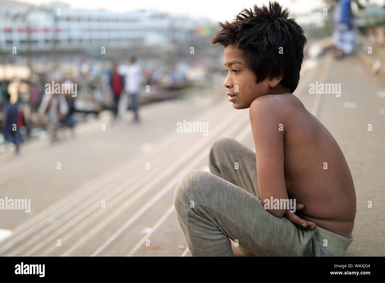 Street child in Dhaka, Bangladesh. Bangladesh has an estimated number of above 670,000 street children Stock Photo