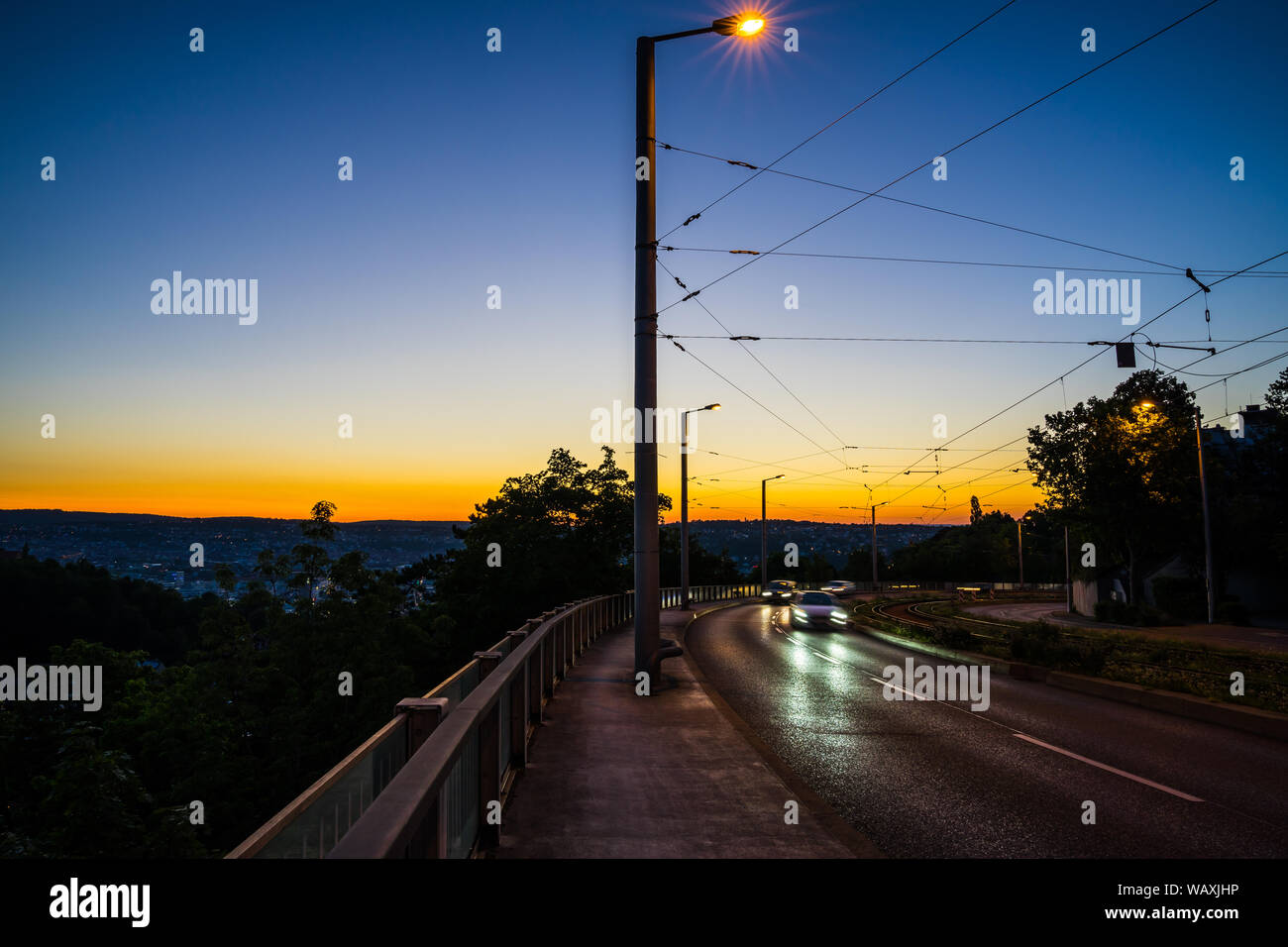 Train driving through street hires stock photography and images Alamy