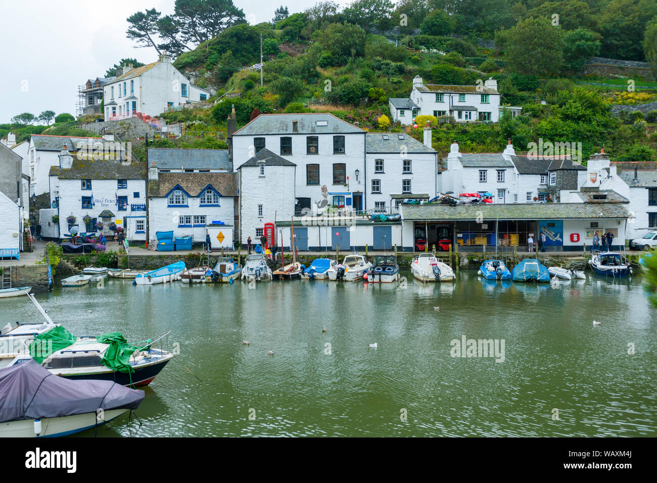 Polperro is a large village, civil parish, and fishing harbour within the Polperro Heritage Coastline in south Cornwall, England. Stock Photo