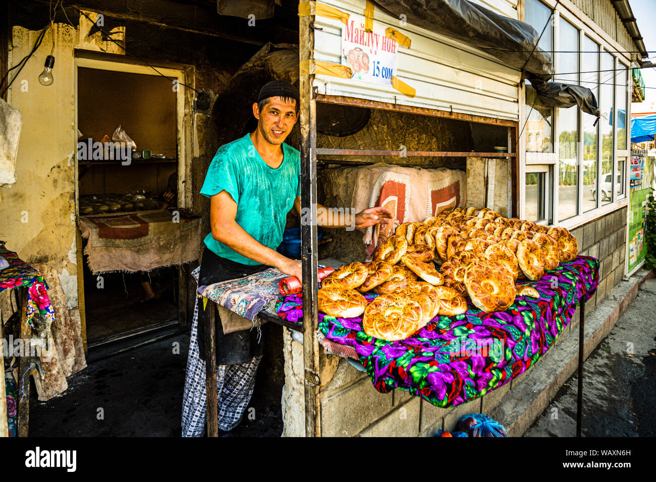 Fresh round Bread Tajik Non (Naan). Artisan Bread Bakery in the City of Osh, Kyrgyzstan Stock Photo
