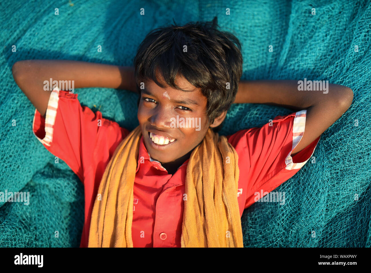 Young fisherman in a traditional fishing village in Rameswaram, Tamil Nadu, India Stock Photo