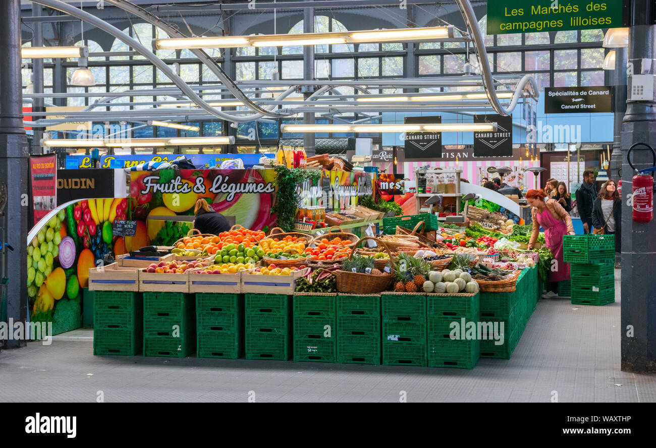 LILLE, FRANCE - APRIL 16, 2017: stand with a colorfulassortment of fruits and vegetables at the Wazemmes Market. It is one of Lilles largest markets. Stock Photo