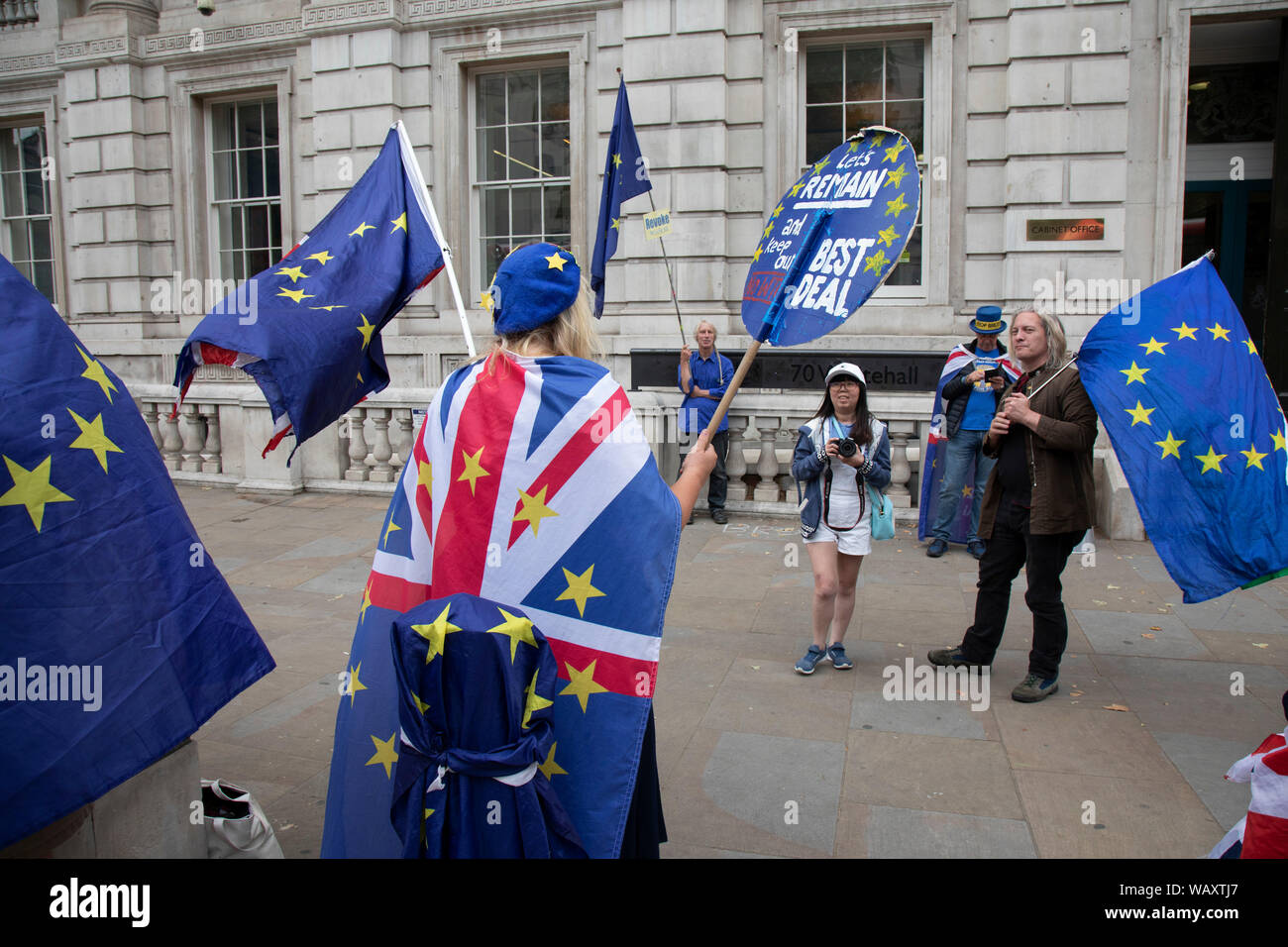 Anti Brexit protester and campaigner Steve Bray wearing European and Union flags outside the Cabinet Office in Westminster as inside the Tory Cabinet meets to discuss Brexit on 16th August 2019 in London, England, United Kingdom. Stock Photo