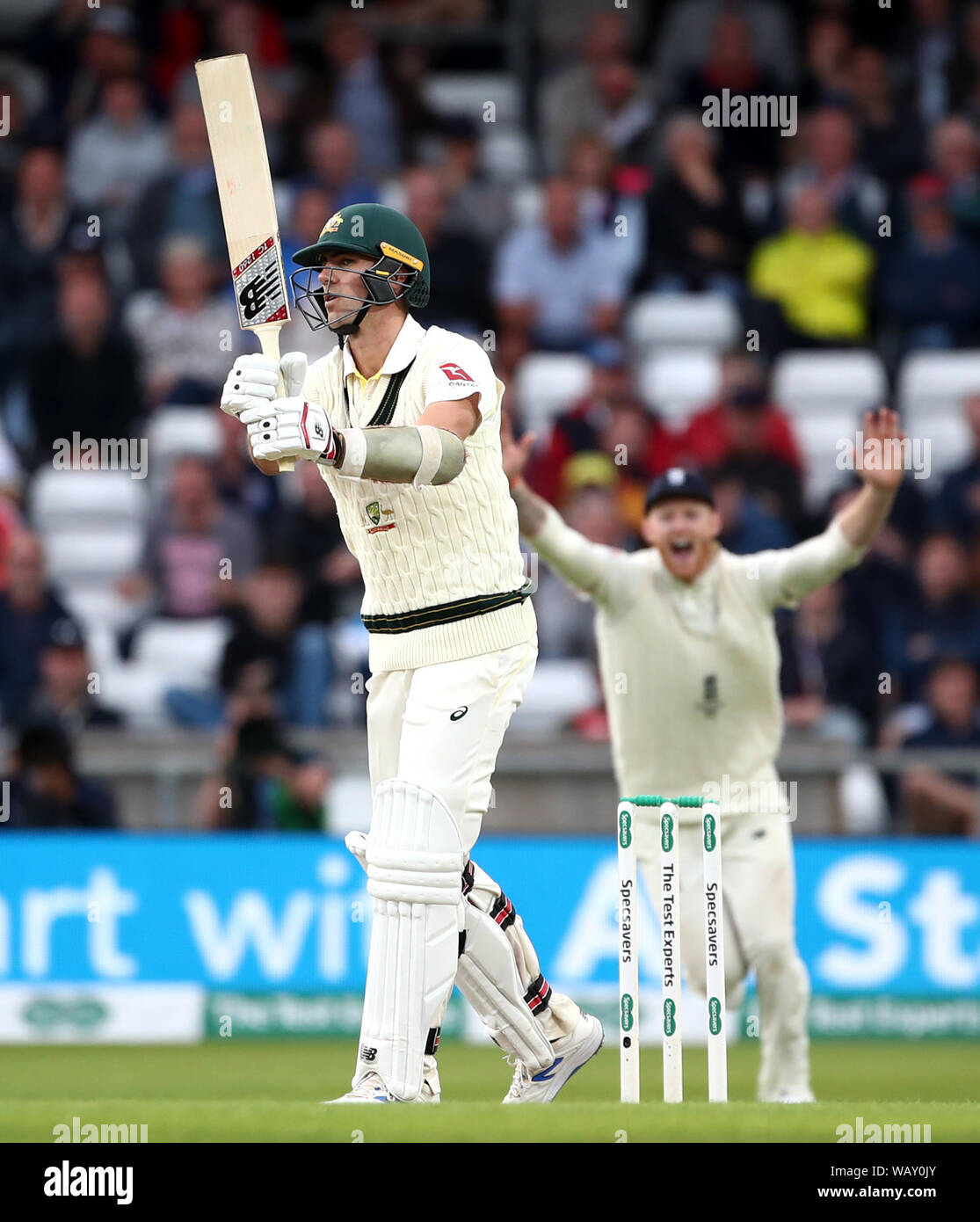 Australia's Pat Cummins reacts as he is caught behind during day one of the third Ashes Test match at Headingley, Leeds. Stock Photo
