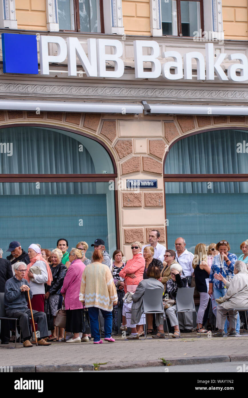 RIGA, Latvia. 22nd Aug, 2019. People are standing in a row to wait for ...