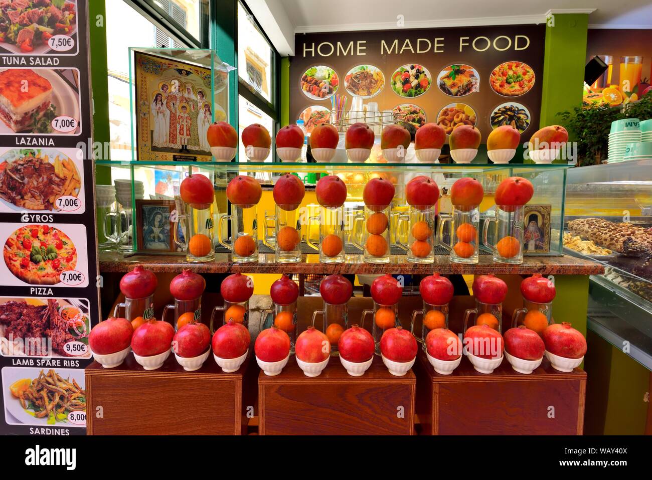 Pomegranate,pomegranates,outdoor display,street display,Kerkyra, Ionian islands,Greece,Grrek islands,tourist taverna, Stock Photo