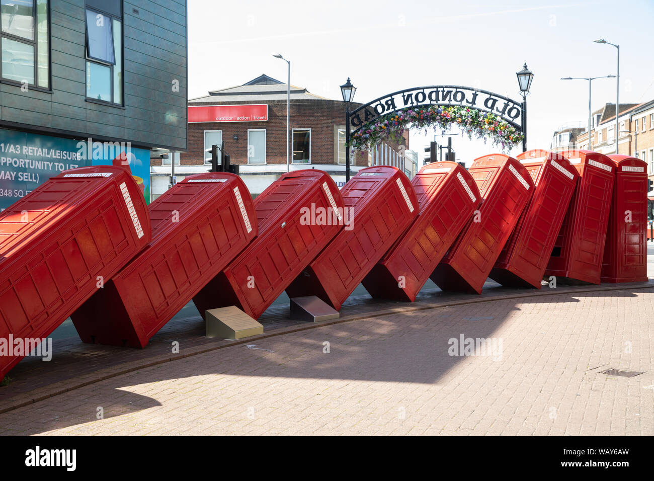 12 telephone boxes toppled over like dominoes is symbolic of Kingston