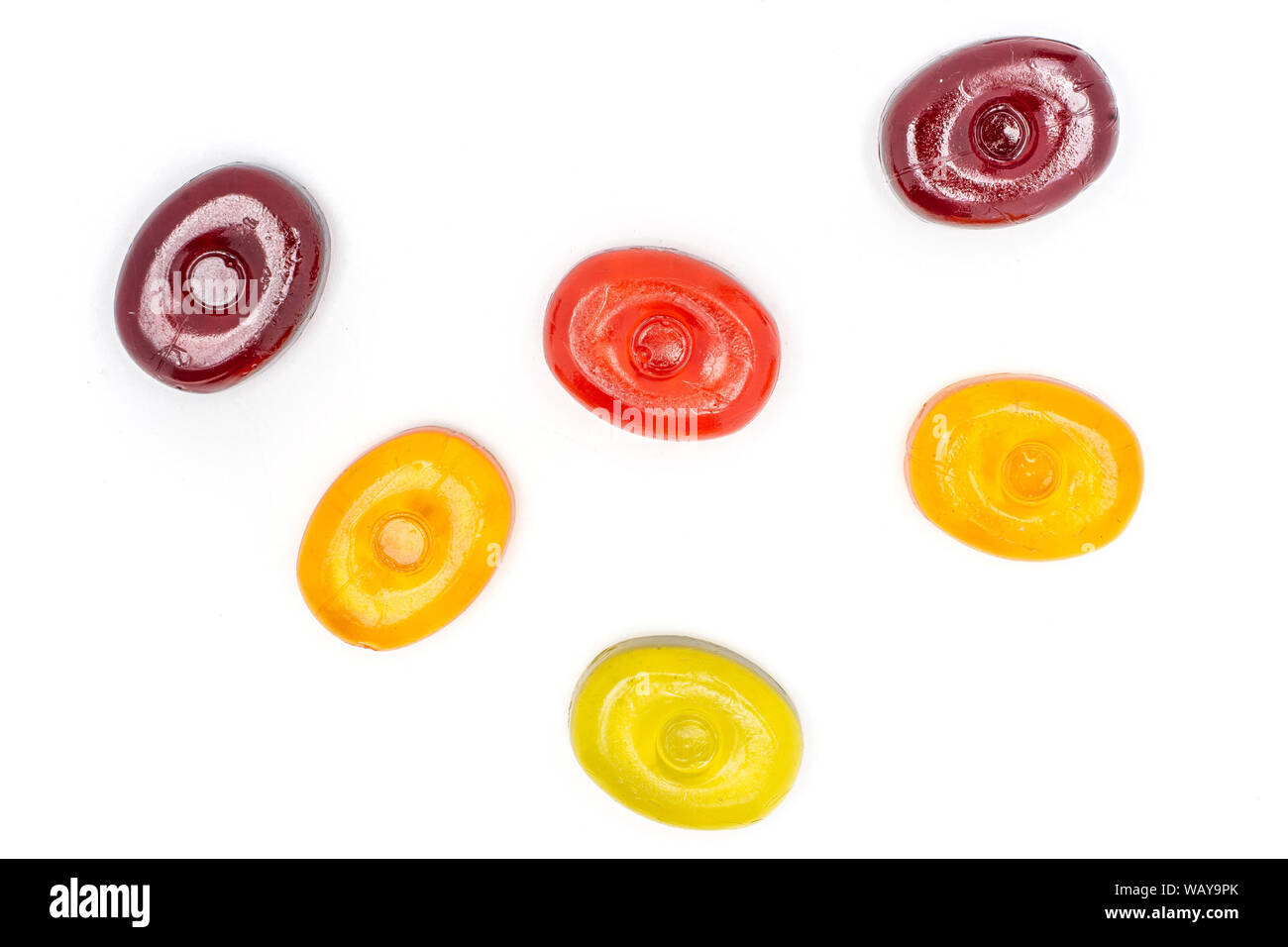 Group of six whole colourful hard candy flatlay isolated on white ...