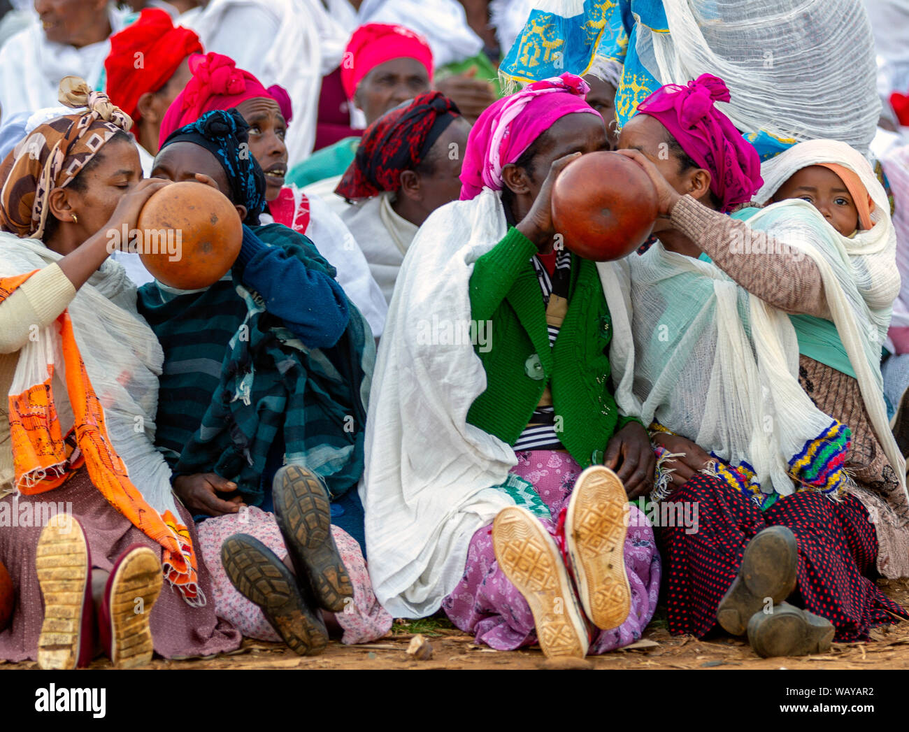 Women drink traditional beer from calabash Chencha market southern