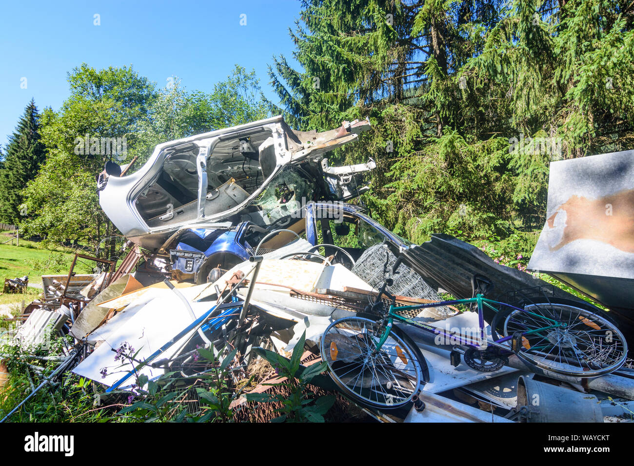 Rottenmann: privat scrapyard, car, bicycle in Hochsteiermark, Steiermark, Styria, Austria Stock Photo