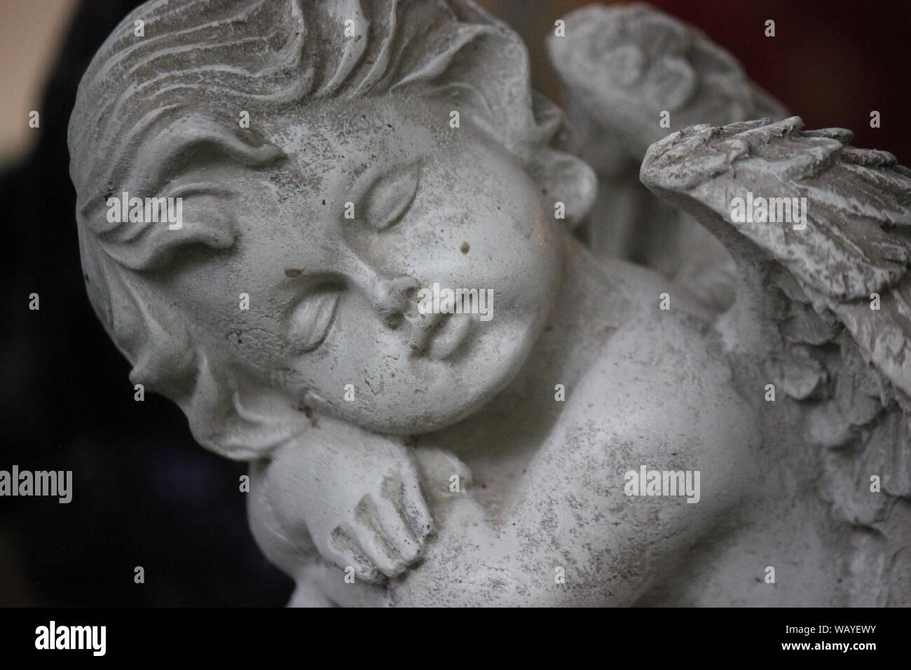 Beautiful sleeping perfect little Angel statue Stock Photo Alamy