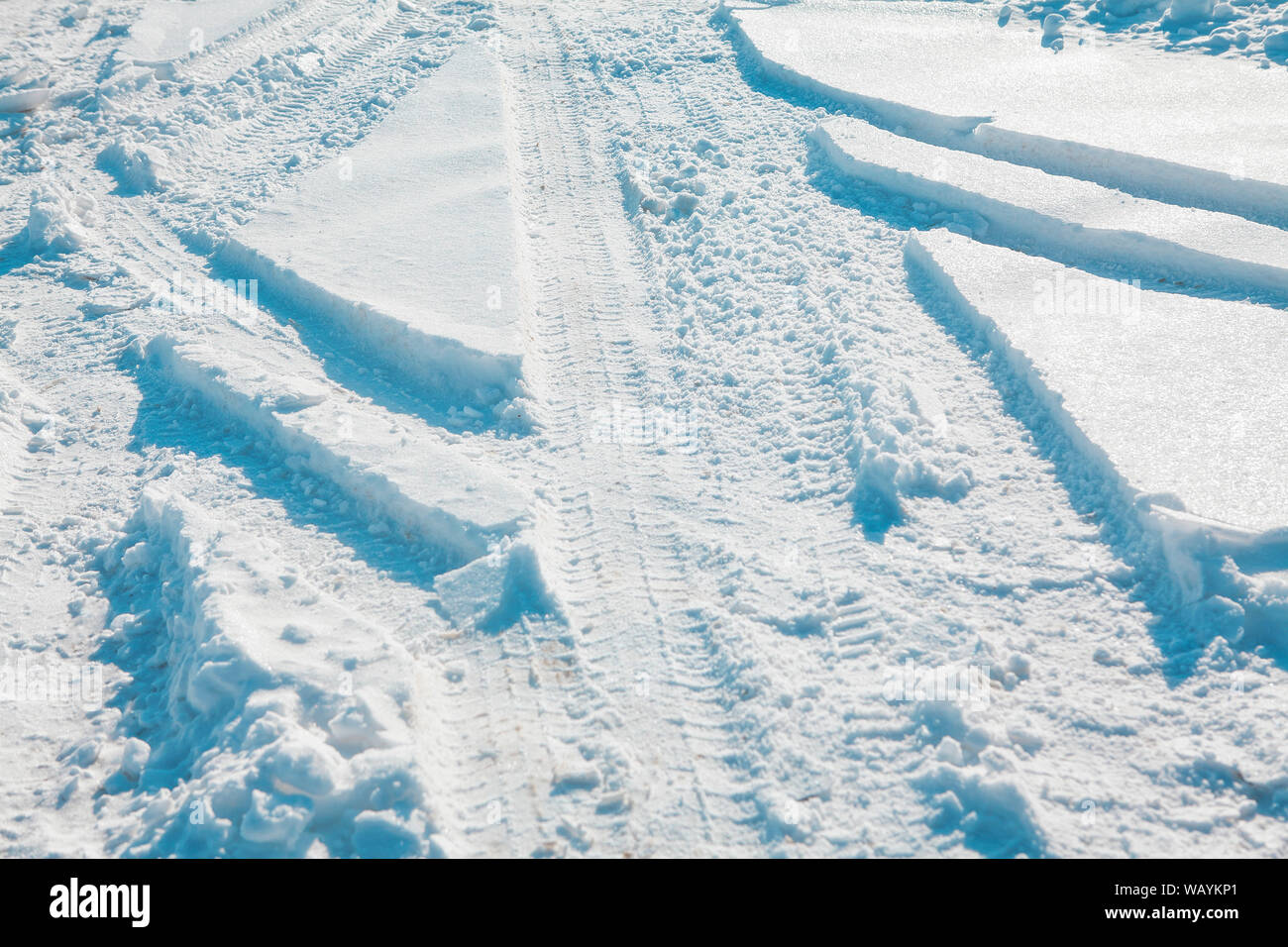 winter background with car traces on the snow Stock Photo - Alamy